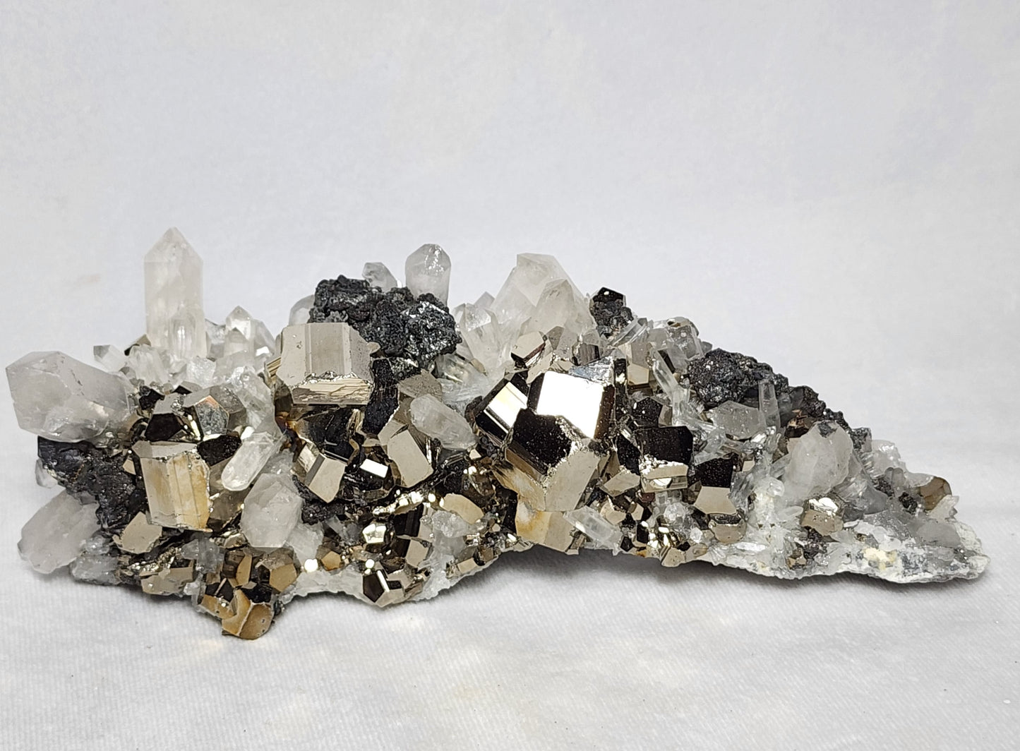 Glistening Pyrite Cubes and Captivating Quartz Points