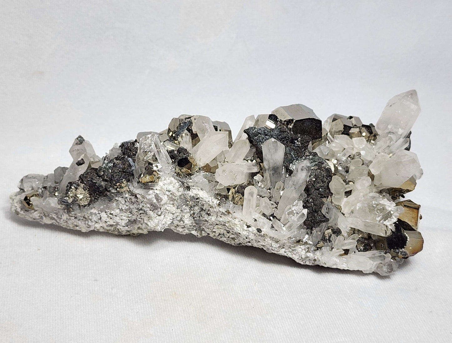 Glistening Pyrite Cubes and Captivating Quartz Points