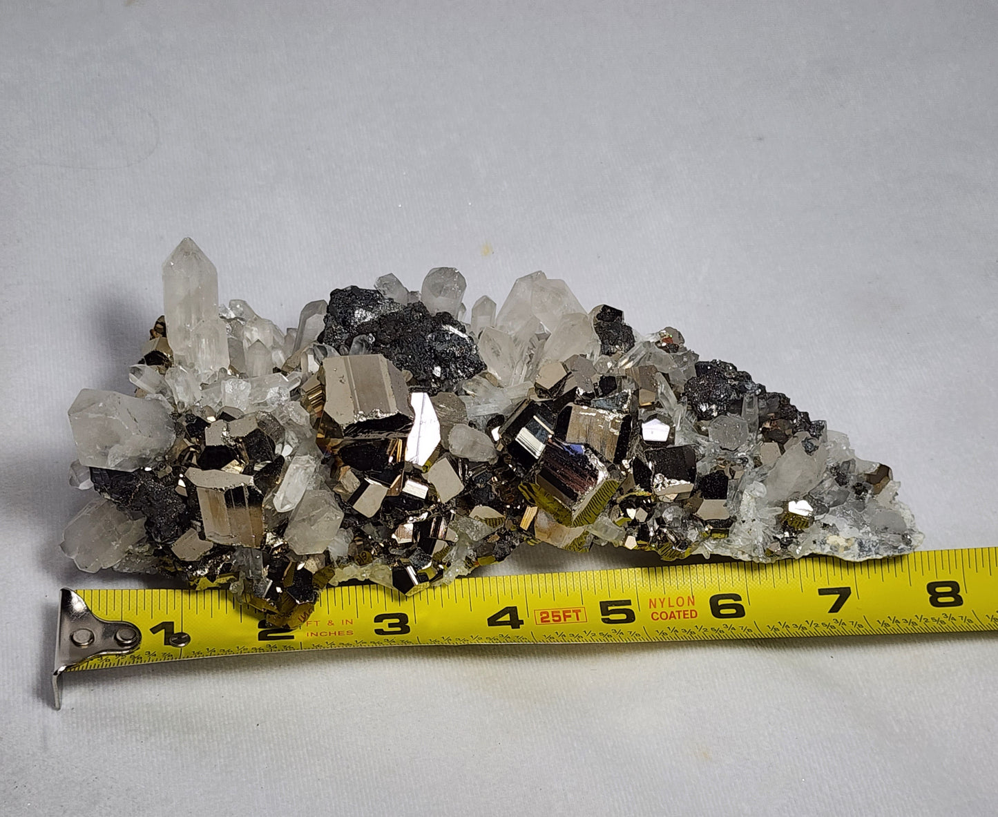 Glistening Pyrite Cubes and Captivating Quartz Points