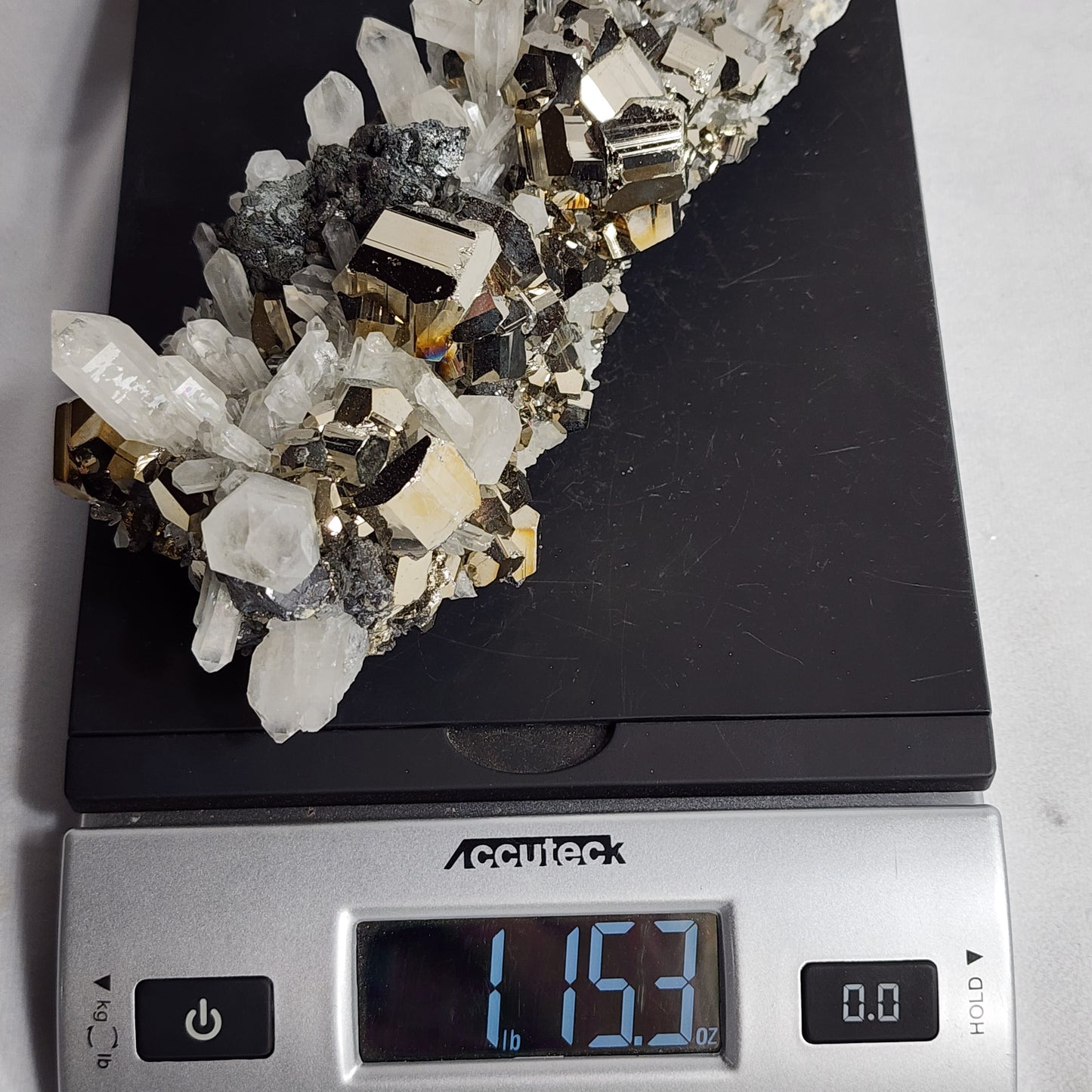 Glistening Pyrite Cubes and Captivating Quartz Points